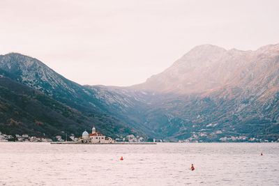 Scenic view of beach against mountains