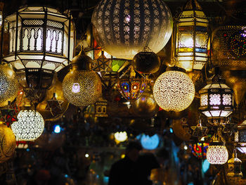 Low angle view of illuminated chandelier