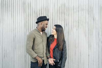 Young couple standing outdoors