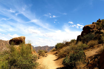 Scenic view of landscape against cloudy sky