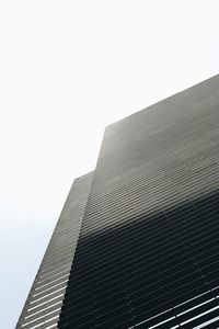 Low angle view of modern building against clear sky