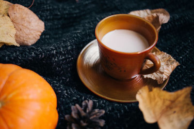 High angle view of coffee cup on table