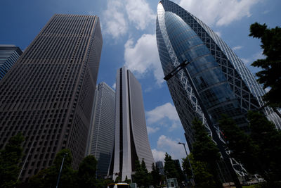 Low angle view of skyscrapers against sky