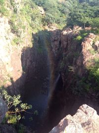 High angle view of waterfall in forest