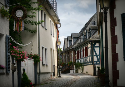 Narrow street amidst buildings in town