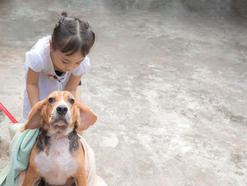 Portrait of girl with dog