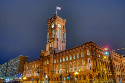 The red town hall of berlin at night