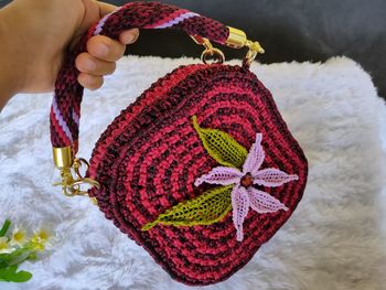 Close-up of woman hand holding ice cream cone