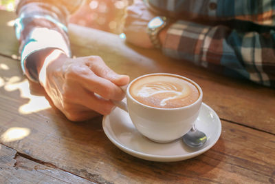 Coffee cup on table