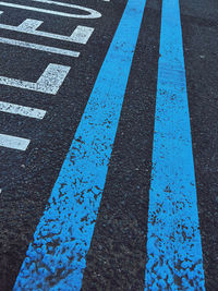 High angle view of sign on road