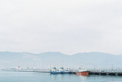 Scenic view of boats in sea