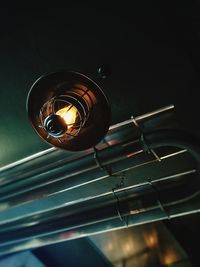 Low angle view of illuminated light bulb