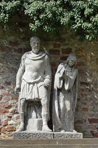 Statue against wall