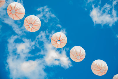 Low angle view of basketball hoop against blue sky