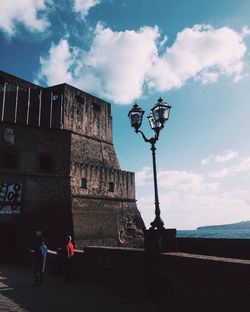 Silhouette people against clear sky