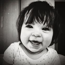 Close-up portrait of smiling girl