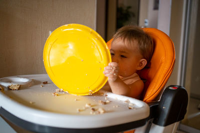 Portrait of cute boy in plate