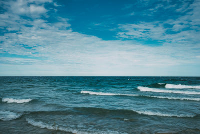 View of calm blue sea against sky