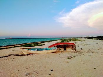 Scenic view of beach against sky