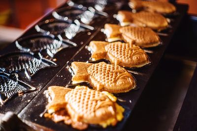 Close-up of fish shaped pastries