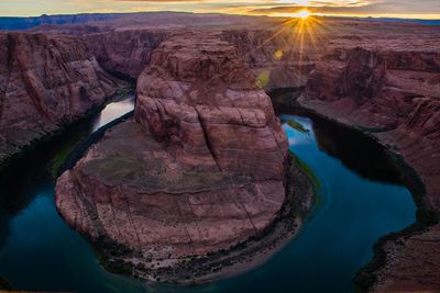 Scenic view of horseshoe bend during sunset