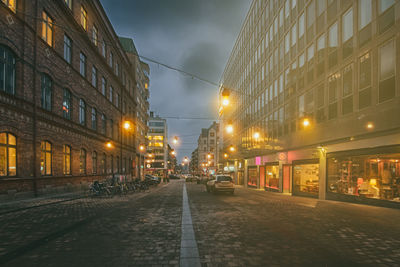 Illuminated street at night