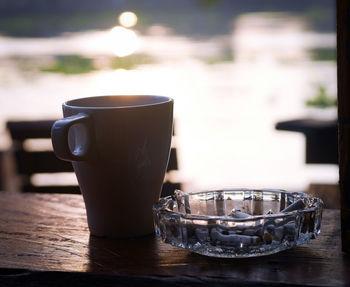 Close-up of coffee cup on table