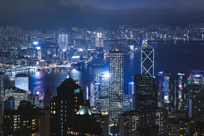 Illuminated buildings in city at night