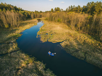 High angle view of lake amidst trees