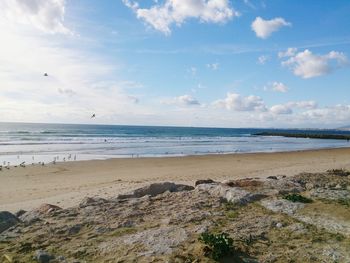 Scenic view of beach against sky