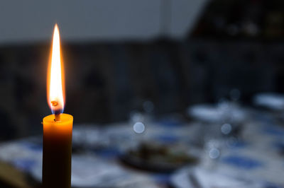 Close-up of illuminated candle