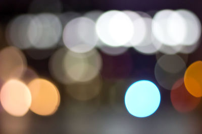 Defocused image of illuminated lights at night