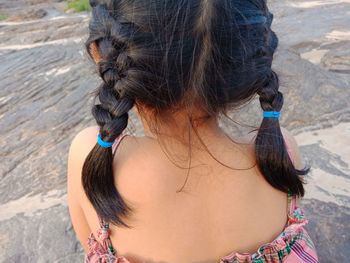 Rear view of girl with braided hair