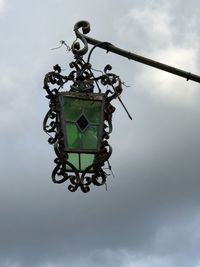 Low angle view of street light against sky