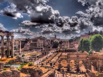 View of old town against cloudy sky