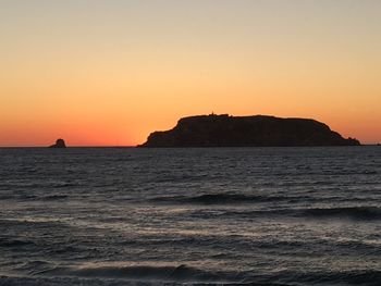 Scenic view of sea against sky during sunset