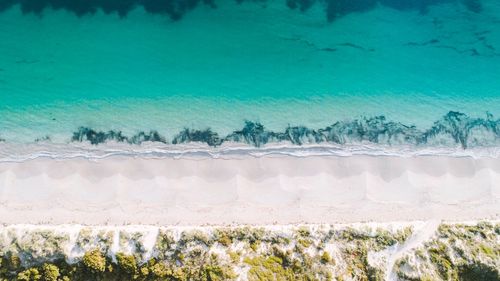 High angle view of beach against blue sky