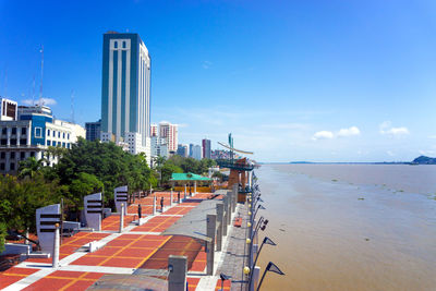 High angle view of malecon in city against sky during sunny day