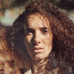 Close-up portrait of woman with eye make-up