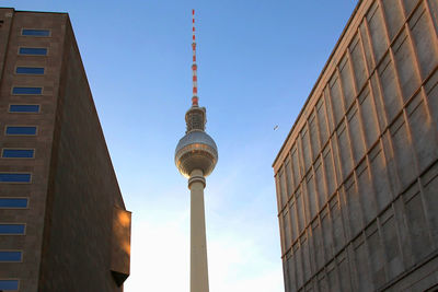 Low angle view of fernsehturm tower against sky