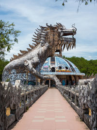 Statue of bridge against sky