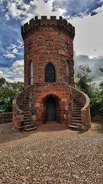 Low angle view of old ruin against sky