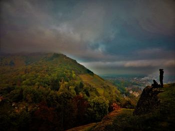 Scenic view of mountains against sky at sunset