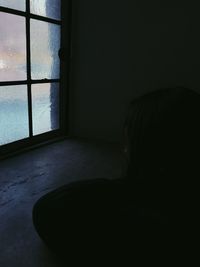 Man relaxing on window at home