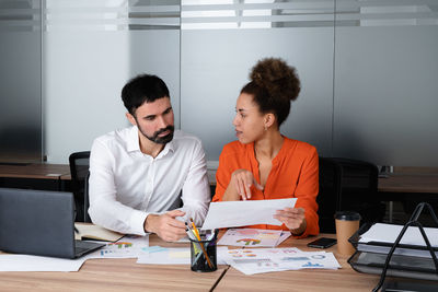 Business colleagues working at office