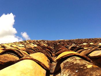 Low angle view of built structure against blue sky