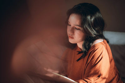 Side view of woman looking away