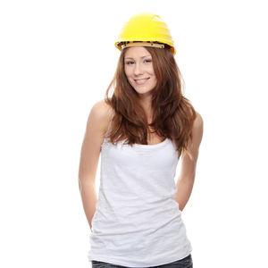 Portrait of a smiling young woman over white background