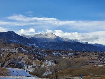 Scenic view of snowcapped mountains against sky