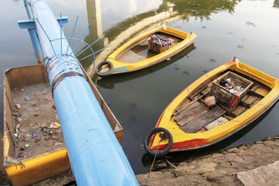 High angle view of abandoned boat moored at lake